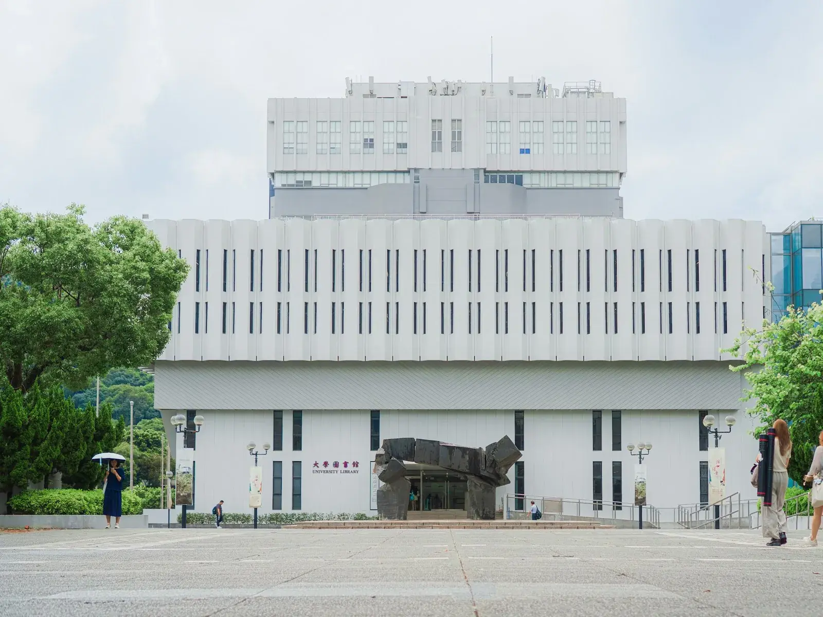 Students crossing the plaza outside the Chinese University of Hong Kong library